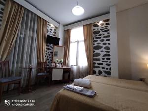 Porto Lesvos hotel客房内的一张或多张床位