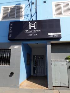 GualeguaychúMacaripana的一座标有马丹萨斯酒店标志的建筑