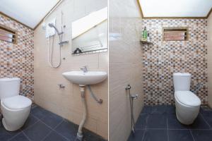 关丹OYO 89873 Nurbayu Chalet的一间带水槽、卫生间和淋浴的浴室