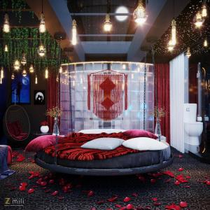 下龙湾Zen Hotel Hạ Long的一间卧室配有一张带红色枕头的大床