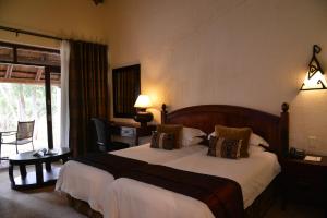 库瓦马里汀洛奇酒店客房内的一张或多张床位