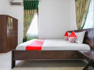 OYO 3789 Bukit Somber Residence Syariah客房内的一张或多张床位
