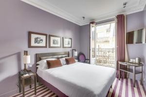 Hotel Duret Paris客房内的一张或多张床位