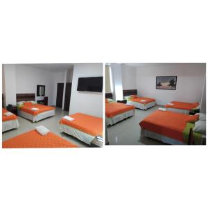 曼塔Manta Airport Hotel的两张带两张床的房间的照片
