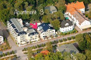 巴贝Apartment-Seemoewe-1A-Standlage-nur-150m-mit-Parkplatz的住宅区空中景观