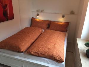 Haus-Atlantik-App-37客房内的一张或多张床位