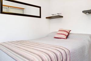 Apartamento en Palermo客房内的一张或多张床位