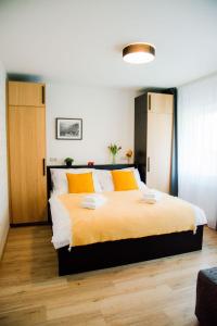 Apartmán PMR客房内的一张或多张床位