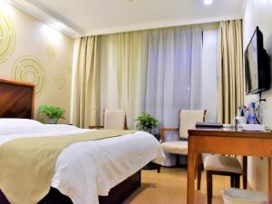 格林豪泰天津市大悲院商务酒店客房内的一张或多张床位