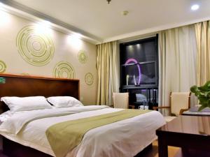 格林豪泰天津市大悲院商务酒店客房内的一张或多张床位