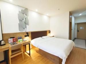 格林豪泰江苏省南京市山西路布料城商务酒店客房内的一张或多张床位
