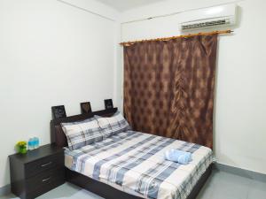 Victoria Homestay Sibu - Next to Shopping Complex, Party Event & Large Car Park Area with Autogate客房内的一张或多张床位