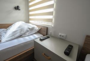Hostel Atrijum客房内的一张或多张床位