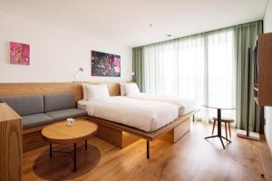 HOTEL ANTEROOM SEOUL客房内的一张或多张床位