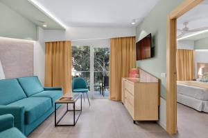 Hotel Riu Playa Park - 0'0 All Inclusive的休息区