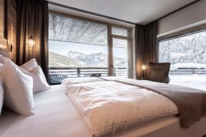 Hotel Niblea Dolomites客房内的一张或多张床位
