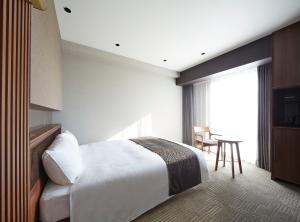 Hotel Trad Hakata客房内的一张或多张床位