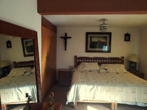 Casa Vista Taxco客房内的一张或多张床位