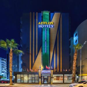 安塔利亚Afflon Hotels Loft City的带有读取中庭酒店的标志的酒店