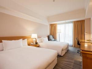 珑山林台北中和饭店客房内的一张或多张床位