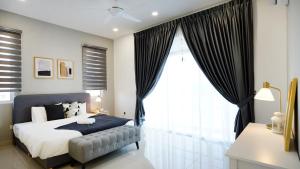 Desaru Exclusive Elegant theme by Joyfully 2M8客房内的一张或多张床位