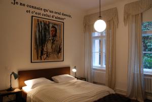 阿特路易斯库申酒店客房内的一张或多张床位