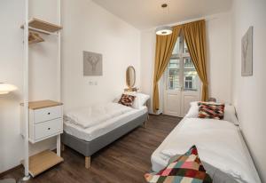 Unesco Prague Apartments客房内的一张或多张床位