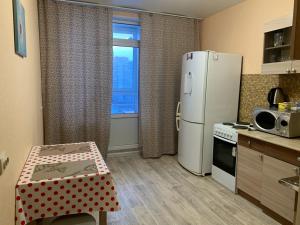 Уютная квартира на Захарова的厨房或小厨房