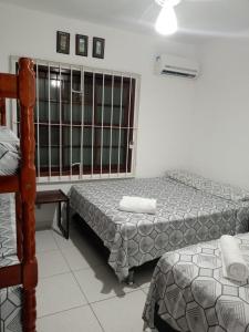 Casa do Tio Eri - Geribá - 100 metros da Praia客房内的一张或多张床位