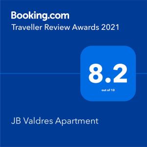 马尼拉JB Valdres Apartment的手机的屏幕截图,带短信旅行审查奖