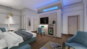 施派尔多姆霍夫酒店的一间卧室配有一张床、一张书桌和一台电视。