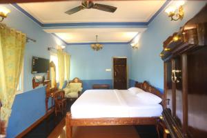 Hillfort Hotels & Resorts Yelagiri客房内的一张或多张床位