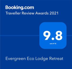 TujeringEvergreen Eco Lodge Retreat的蓝色方框的屏幕,数字为9
