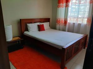 Jayson Furnished Apartment, Nairobi客房内的一张或多张床位
