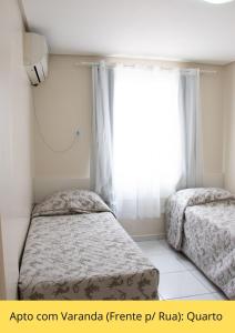 多纳奈美住宿公寓客房内的一张或多张床位