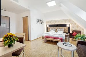 陶本罗腾堡拉普酒店客房内的一张或多张床位
