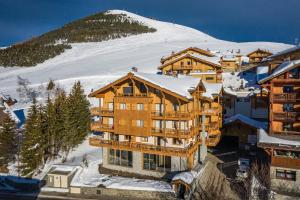 冬天的Residence Hameau de Clotaire Alpe d'Huez - by EMERALD STAY