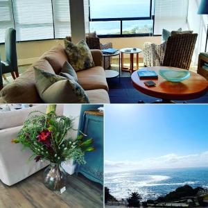 赫曼努斯The Sun,Whales and Waves seafront apartment的客厅配有沙发和带花瓶的桌子