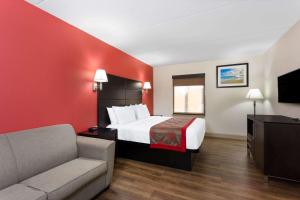 华美达温德姆巴拿马城酒店客房内的一张或多张床位