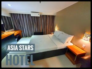 亚洲之星酒店 客房内的一张或多张床位