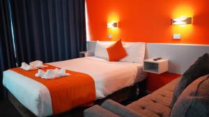 海滨洛奇汽车旅馆客房内的一张或多张床位