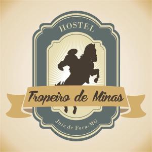 尤西德福拉Hostel Tropeiro de Minas的带有Houstonisco de minas logo的顶峰的矢量图解