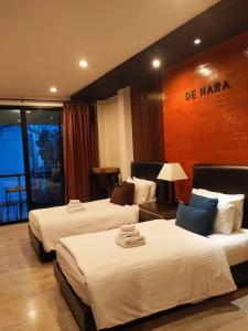 Hotel De Nara-SHA Extra Plus客房内的一张或多张床位