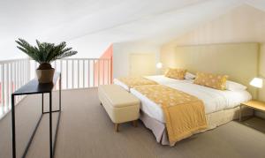 加纳克罗阿塞特酒店客房内的一张或多张床位