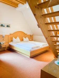 Landhotel Bauernschmitt客房内的一张或多张床位