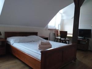 Zielony Dworek客房内的一张或多张床位