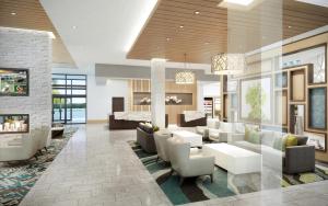 亚特兰大Hyatt House Atlanta Perimeter Center的一间客厅,配有白色家具和一间卧室