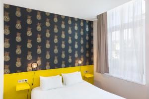 Hôtel Marsiho by HappyCulture - ex Best Western Marseille客房内的一张或多张床位