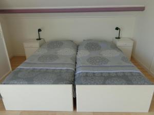 Kamerverhuur Advenco客房内的一张或多张床位