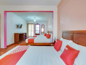 OYO Hotel Huautla, Oaxaca客房内的一张或多张床位
